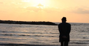 I scour the internet looking for pictures that are appropriate for our articles. And you know what, there isn't a lot around on wills that isn't stock photography of documents that say "Last Will and Testament" or pictures like this. What is this? Is he meditating on death? Is he about to walk into the water? It's actually pretty grim when you think about it. 